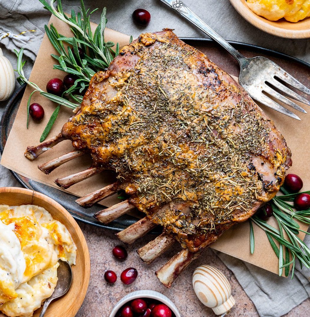 Main St Bistro scalloped potatoes and a cooked rack of lamb with rosemary and cranberries